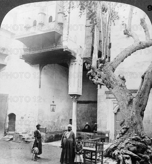 'The harem windows in the court of a wealthy Cairene's house, Cairo, Egypt', 1905.Artist: Underwood & Underwood