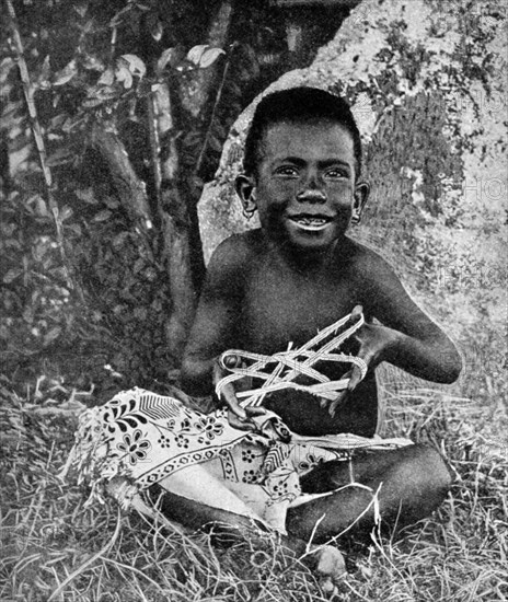 Kiwai child, living at the entrance to the Fly River, New Guinea, 1922. Artist: WN Beaver