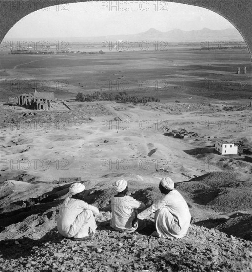 'Across the plain of Thebes and past the Memnon statues from the cliffs, Egypt', 1905.Artist: Underwood & Underwood