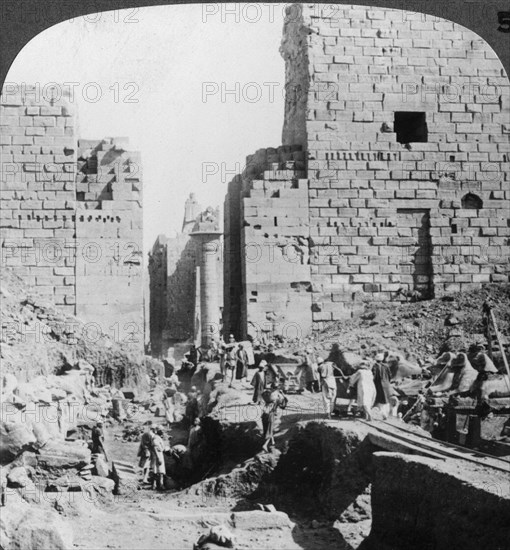 'Excavating an avenue to the Temple of Karnak, Thebes, Egypt', 1905.Artist: Underwood & Underwood