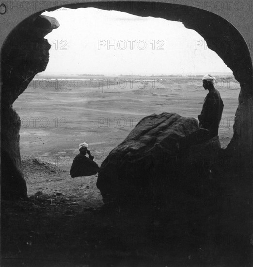 'Walled city of El Kab, seen from a door of a tomb in the cliffs, Egypt', 1905.Artist: Underwood & Underwood