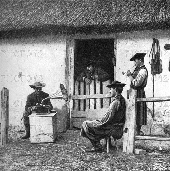 Leisure time for cowherds, Hungary, 1922.Artist: AW Cutler