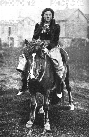 A milkmaid on her morning round, Iceland, 1922. Artist: Unknown