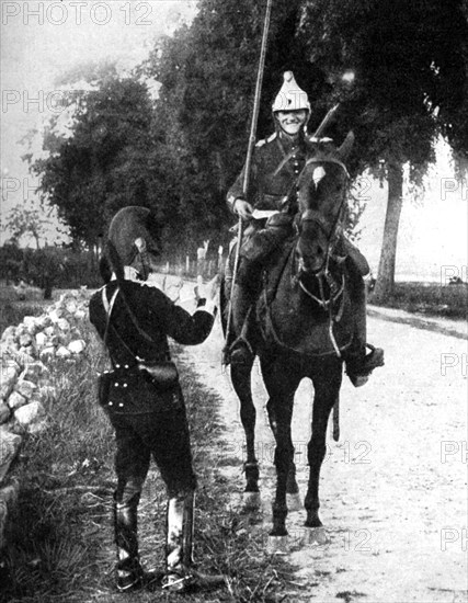 'French dragoon, delivering passport to alert Belgian picket', First World War, 1914. Artist: Unknown