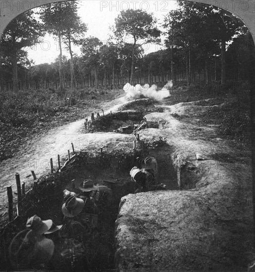 Clearing the remaining Germans out of the trenches by hand grenages, 1900s.Artist: Crown