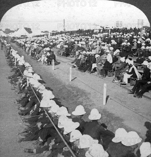 Watching a football match between the Lancashire Fusiliers and Border regiments, Delhi, 1910s.Artist: HD Girdwood