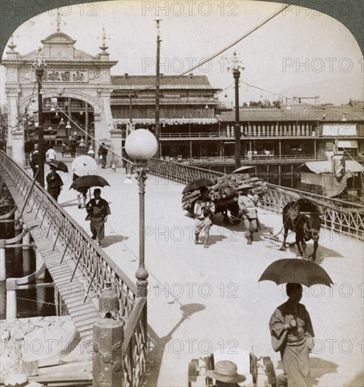 Looking west over the Kamo River (Kamogawa) at Shijo bridge, Kyoto, Japan, 1904.Artist: Underwood & Underwood