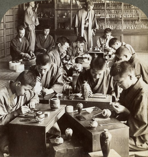 Expert workmen creating designs in cloisonne, Kyoto, Japan, 1904. Artist: Underwood & Underwood