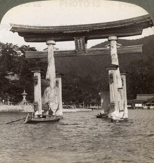 Sacred torii gate rising from the sea, Itsukushima Shrine, Miyajima Island, Japan, 1904. Artist: Underwood & Underwood