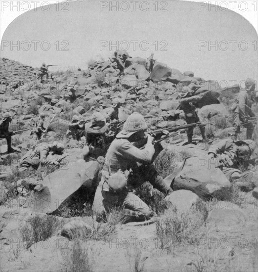 The Warwicks skirmishing with Boers near Weppener, east of Bloemfontein, South Africa, 1901. Artist: Underwood & Underwood