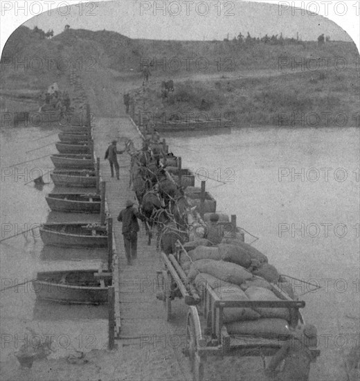 Pontoon bridge across the Modder River, Boer War, South Africa, 1900.Artist: Underwood & Underwood