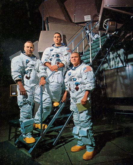 The crew of Apollo 8 in front of a simulator, 1968.Artist: NASA