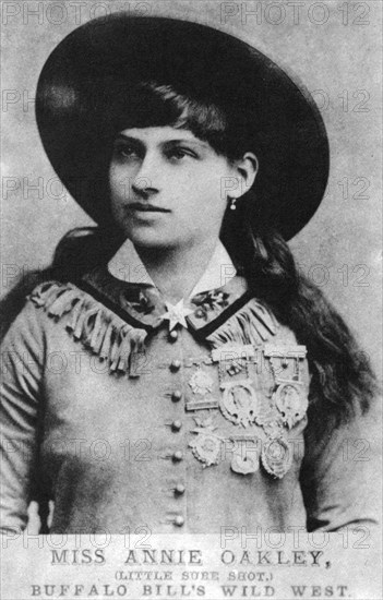 Annie Oakley, American exhibition sharpshooter, late 19th century (1954). Artist: Unknown