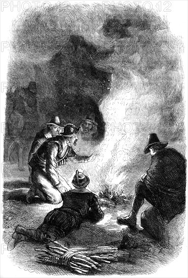 Pilgrim Fathers around a watch-fire, c1620 (c1880). Artist: Unknown