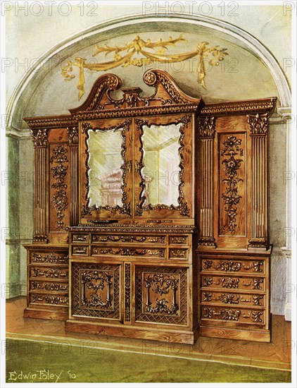 Carved enclosed mahogany bookcase, style of Chippendale, French influence, 1911-1912.Artist: Edwin Foley