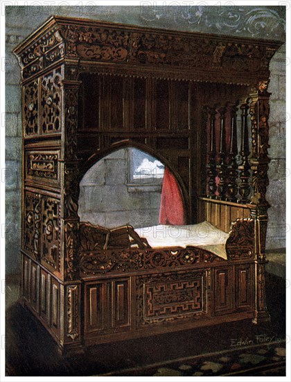 Carved oak bedstead of Jeanne d'Albret, 1910.Artist: Edwin Foley