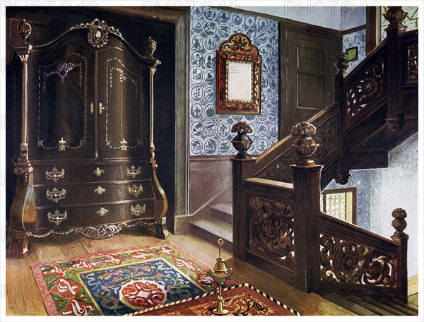 Carved walnut bombe armoire with chased mounts, 1910.Artist: Edwin Foley