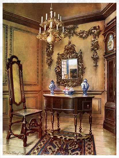 Panelling, mirror frame, walnut table and chair, Charles Wesley's walnut high case clock, 1910.Artist: Edwin Foley