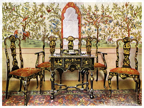 Black lacquer settee, chairs and table and red lacquer mirror, 1910.Artist: Edwin Foley