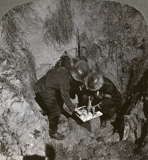 Captured German prisoner giving information to his captors, World War I, 1914-1918.Artist: Realistic Travels Publishers