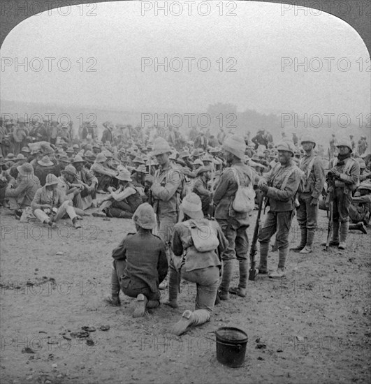 Boer prisoners resting on the road from Paardeberg to Modder River, South Africa, 1900-1902.Artist: Underwood & Underwood