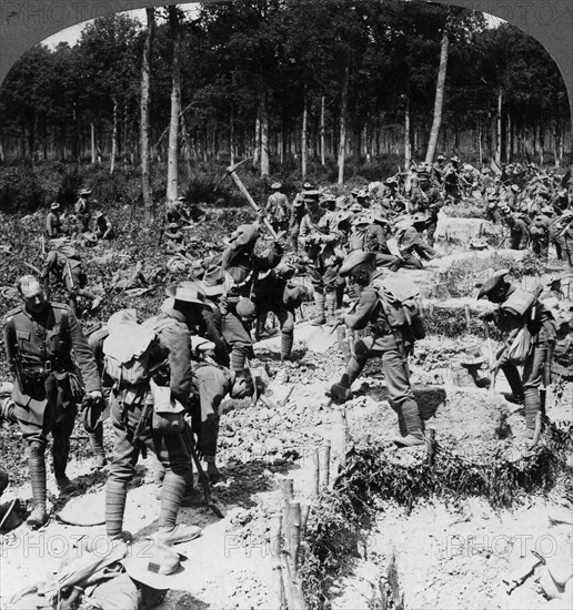 Soldiers digging trenches, World War I, 1914-1918.Artist: Realistic Travels Publishers