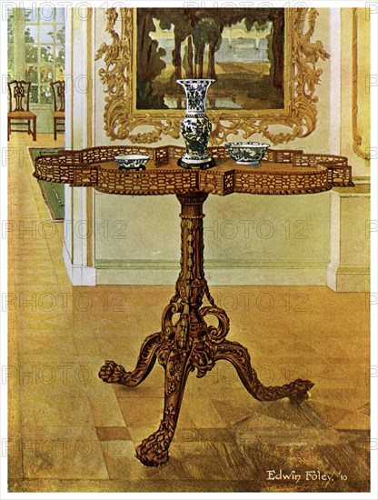 Shaped fret rimmed gallery table, Chippendale School, 1911-1912.Artist: Edwin Foley