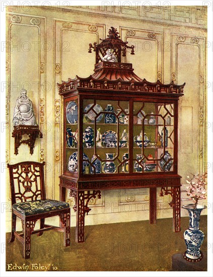 Carved china case in Chippendale's Chinese manner, 1911-1912.Artist: Edwin Foley