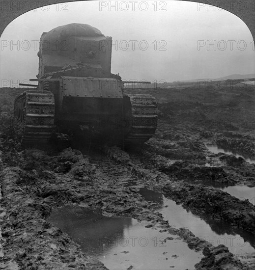 Whippet tank on a muddy battlefield, Morcourt, France, World War I, 1918.Artist: Realistic Travels Publishers