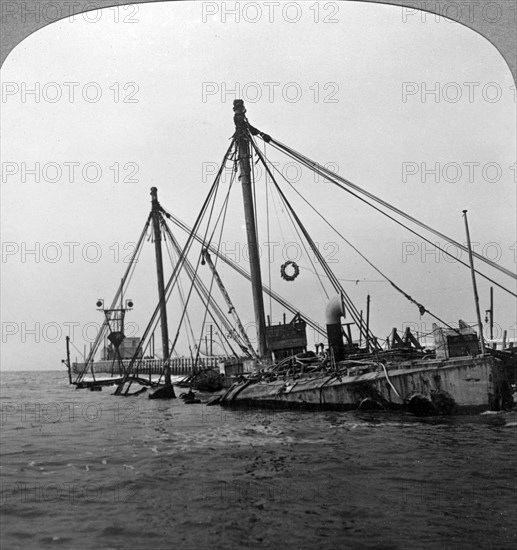 Sunken warship HMS 'Vindictive', Ostend, Belgium, World War I, 1918.Artist: Realistic Travels Publishers