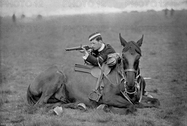 A dismounted lancer at a skirmishing display, 1896. Artist: Gregory & Co