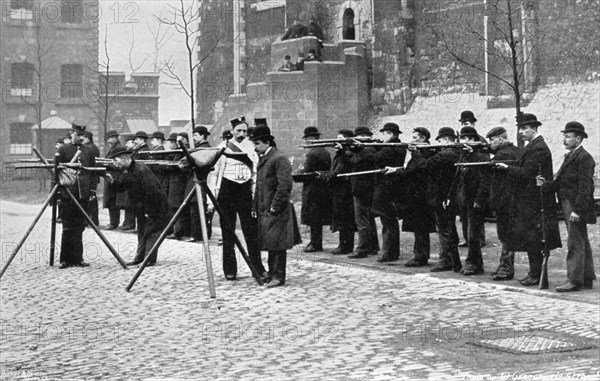 Army reserve men at musketry drill at the Tower of London, 1896. Artist: W Gregory