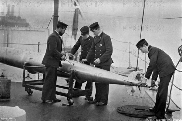 Torpedo instruction on board HMS 'Theseus', 1896.Artist: W Gregory