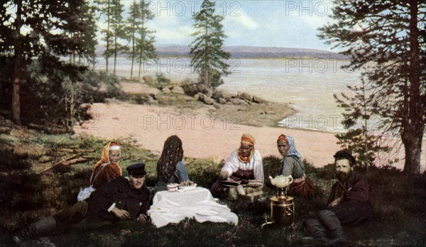 Karelians having tea by a river, near Archangel, Russia, c1930s. Artist: Unknown