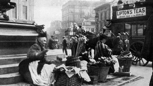 Flower sellers at Piccadilly Circus, London, 1901 (1951). Artist: Unknown