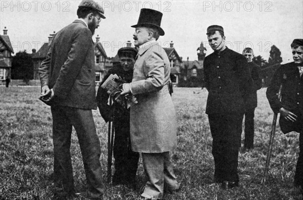 Dr Barnardo at one of his homes, 1905 (1951). Artist: Unknown