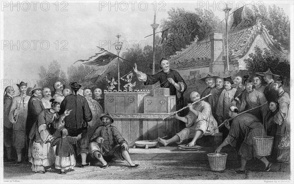 'Raree show at Lin-sin-choo', China, c1843.Artist: G Paterson