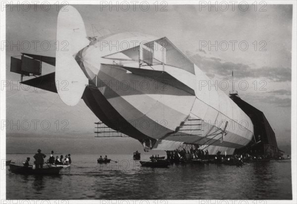 LZ 6 entering a floating hanger, Halle, Germany, c1909-1910 (1933). Artist: Unknown