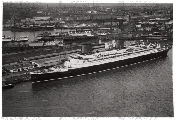 Aerial view of Bremen harbour, Germany, and the liner 'Europa', from a Zeppelin, c1931 (1933). Artist: Unknown