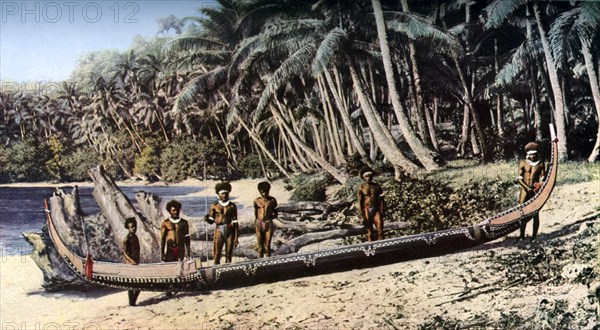 Native canoe on a palm shaded beach, Solomon Islands, c1923. Artist: York & Son