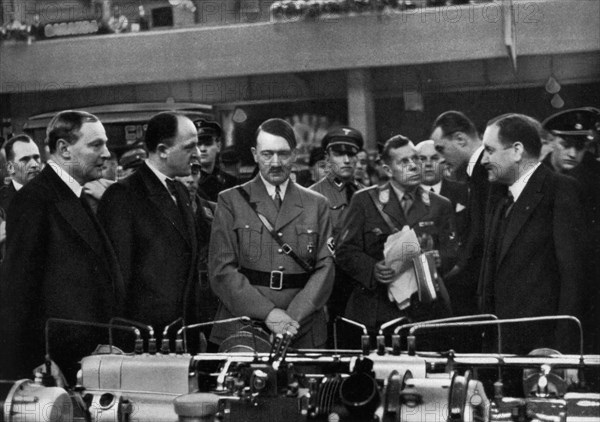 Adolf Hitler at a car show in Berlin, Germany, 1935. Artist: Unknown