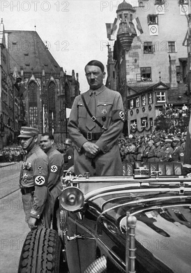 Adolf Hitler waiting for SA 'Brownshirts', Nuremberg, Germany, 1935. Artist: Unknown