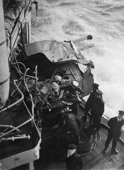 Damaged anti-aircraft gun on the British battleship HMS 'Malaya', off the coast of Portugal, 1937. Artist: Unknown