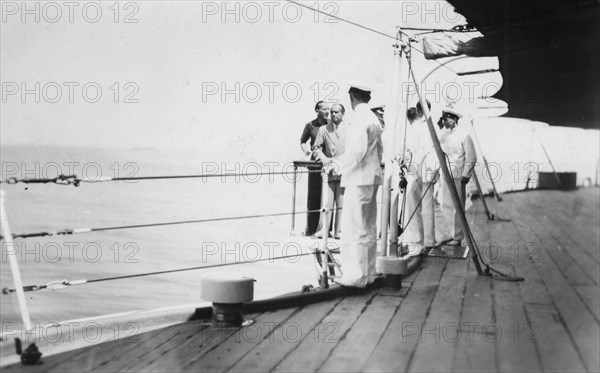 American actor and film director Douglas Fairbanks, Sr on board HMS 'Malaya', Venice, Italy 1938. Artist: Unknown