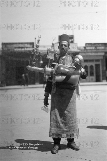 A lemonade vendor, Damascus, Syria, c1920s-c1930s(?). Artist: Unknown