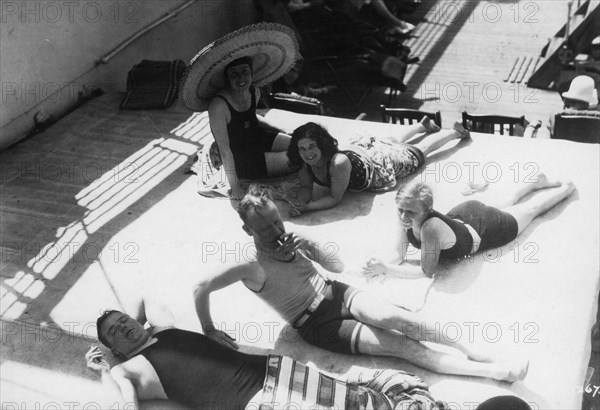 Passengers sunbathing on board a cruise ship, c1920s-c1930s(?). Artist: Unknown