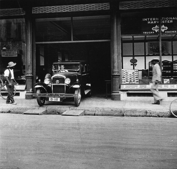 Singer car showroom, Port of Spain, Trinidad, Trinidad and Tobago, 1931. Artist: Unknown