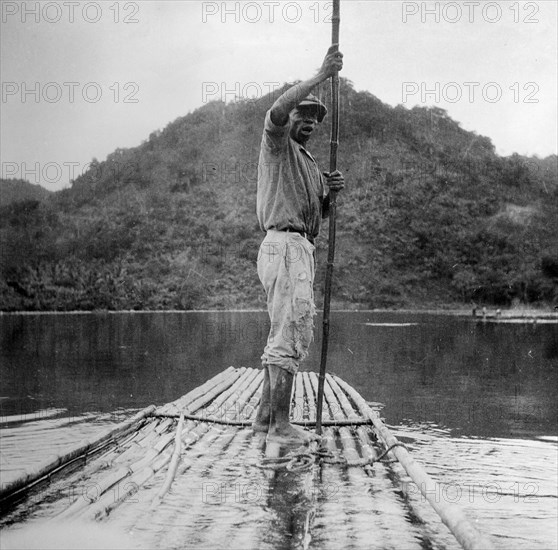 Man on a raft, Kingston, Jamaica, 1931. Artist: Unknown