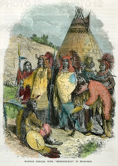 'Mandan Indians, with Medicine Man in Bear Skin', c1875. Artist: Unknown