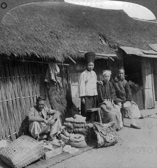 Native shop and customers, near Mogok, northern Burma, c1900s(?).Artist: Underwood & Underwood